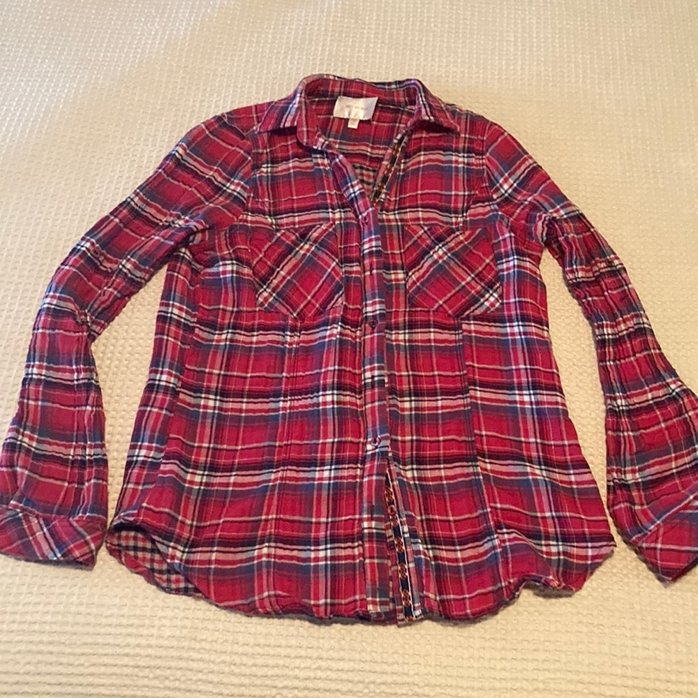 Skies are blue red, blue, white plaid top